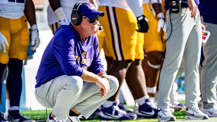 LSU head coach Brian Kelly crouches on the sidelines during a college football game between Ole Miss and LSU at Vaught-Hemingway Stadium in Oxford, Miss., on Saturday, Sept. 27, 2025. LSU head coach Brian Kelly crouches on the sidelines during a college football game between Ole Miss and LSU at Vaught-Hemingway Stadium in Oxford, Miss., on Saturday, Sept. 27, 2025.
