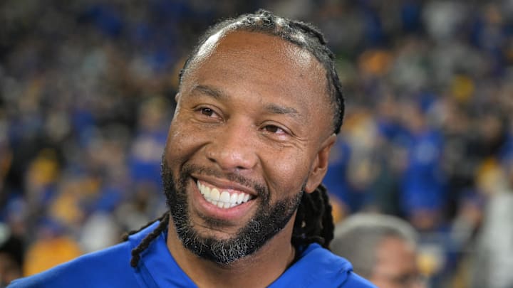 Oct 24, 2024; Pittsburgh, Pennsylvania, USA; Former Pittsburgh Panthers wide receiver Larry Fitzgerald reacts on the sideline against the Syracuse Orange during the second half at Acrisure Stadium. Mandatory Credit: Barry Reeger-Imagn Images