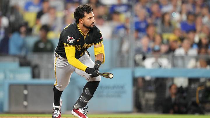 Aug 21, 2026; Los Angeles, California, USA;  Pittsburgh Pirates third baseman Nick Gonzales (3) hits a RBI single in the third inning against the Los Angeles Dodgers at Dodger Stadium.  Mandatory Credit: Kirby Lee-Imagn Images
