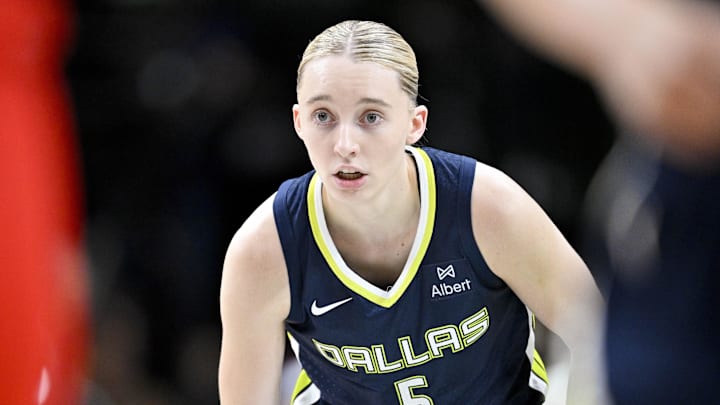 Jun 27, 2025; Dallas, Texas, USA; Dallas Wings guard Paige Bueckers (5) brings the ball up court against the Indiana Fever during the game at the American Airlines Center. Mandatory Credit: Jerome Miron-Imagn Images