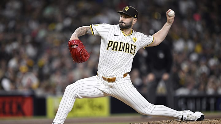 Sep 21, 2024; San Diego, California, USA; San Diego Padres relief pitcher Tanner Scott (66) pitches against the Chicago White Sox during the eighth inning at Petco Park. Mandatory Credit: Orlando Ramirez-Imagn Images