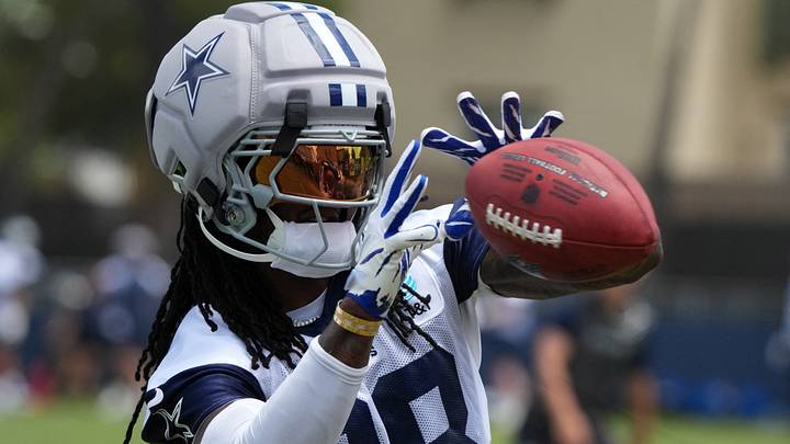 Dallas Cowboys receiver CeeDee Lamb (88) catches the ball at training camp at River Ridge Playing Fields. Dallas Cowboys receiver CeeDee Lamb (88) catches the ball at training camp at River Ridge Playing Fields.