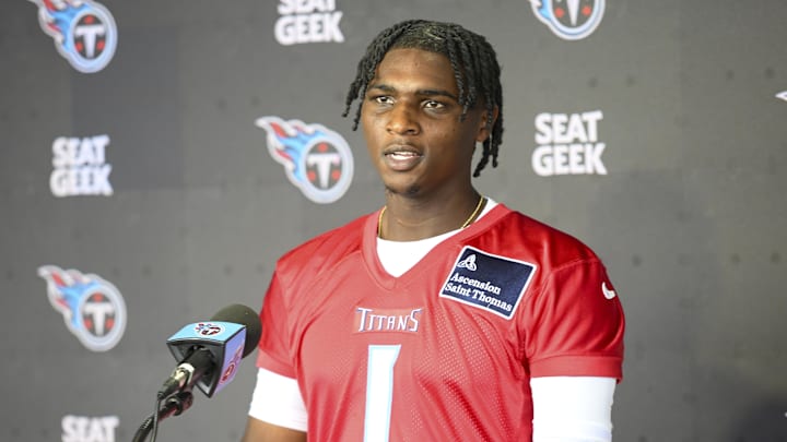 May 10, 2025; Nashville, TN, USA;  Tennessee Titans quarterback Cam Ward (1) talks with reporters after his first day of rookie mini camp  at Saint Thomas Sports Park. Mandatory Credit: Steve Roberts-Imagn Images