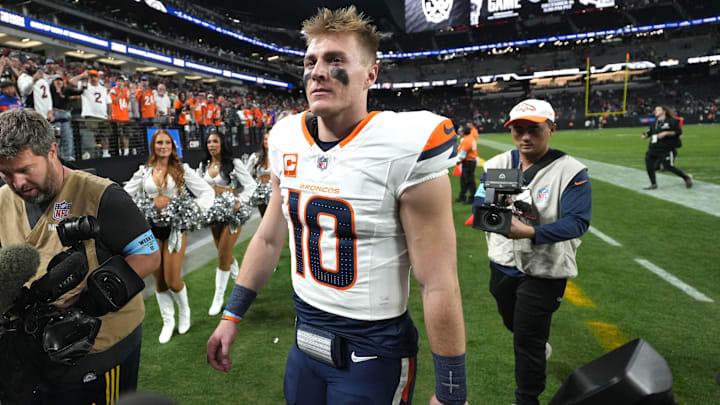Nov 24, 2024; Paradise, Nevada, USA; Denver Broncos quarterback Bo Nix (10) walks off the field after theg ame against the Las Vegas Raiders at Allegiant Stadium. Mandatory Credit: Kirby Lee-Imagn Images