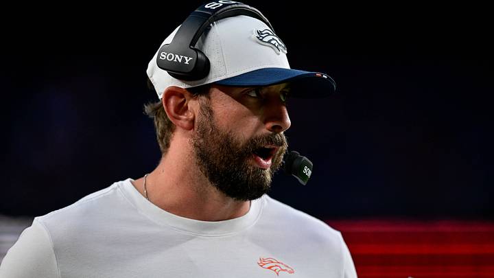 DENVER, CO - AUGUST 16: Denver Broncos quarterbacks coach Davis Webb calls plays vs. the Arizona Cardinals in preseason action. DENVER, CO - AUGUST 16: Denver Broncos quarterbacks coach Davis Webb calls plays vs. the Arizona Cardinals in preseason action.