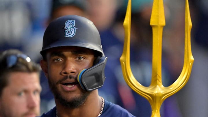 Seattle Mariners center fielder Julio Rodriguez (44) celebrates in the dugout after hitting a solo home run in the fifth inning against the Los Angeles Angels at Angel Stadium on July 24.