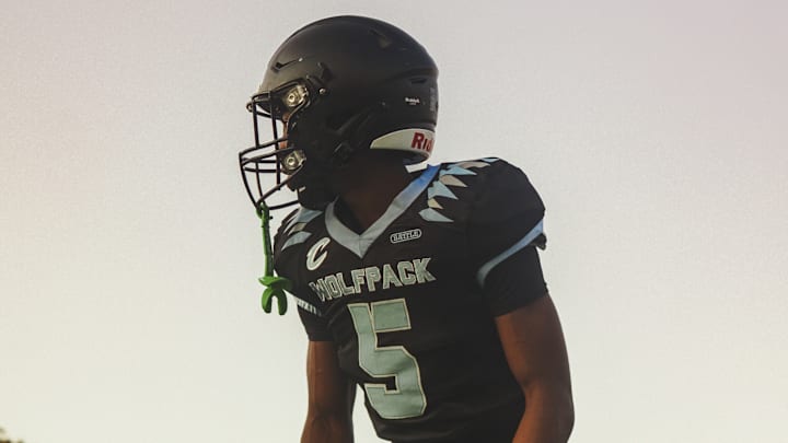 Semaj Lowe warming up for a Friday Night game against Abraham Lincoln