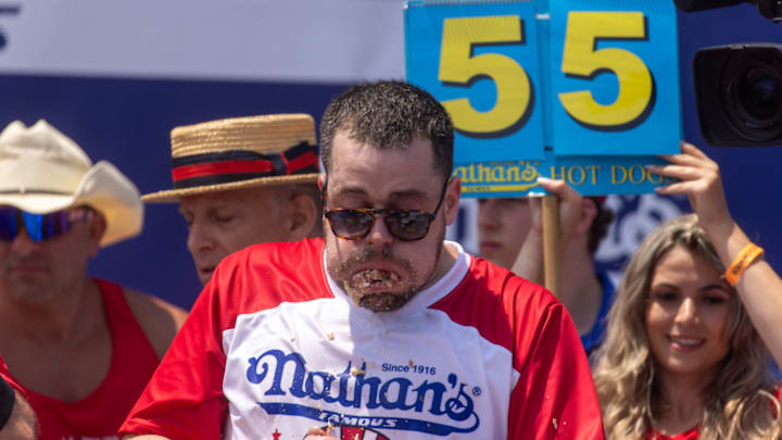 Patrick Bertoletti competes in the 2024 Nathan’s Hot Dog Eating Contest.