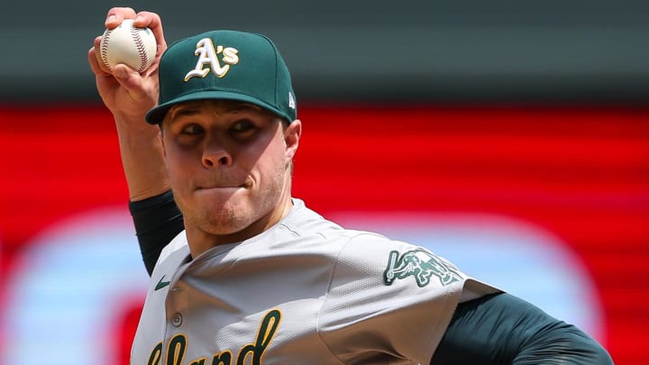 Jun 16, 2024; Minneapolis, Minnesota, USA; Oakland Athletics pitcher Vinny Nittoli (64) delivers a pitch against the Minnesota Twins during the fifth inning of game one of a double header at Target Field. Mandatory Credit: Matt Krohn-USA TODAY Sports