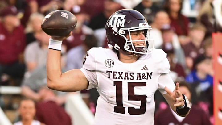 Oct 19, 2024; Starkville, Mississippi, USA;  Texas A&M Aggies quarterback Conner Weigman (15) drops back to pass against the Mississippi State Bulldogs during the fourth quarter at Davis Wade Stadium at Scott Field. Mandatory Credit: Matt Bush-Imagn Images