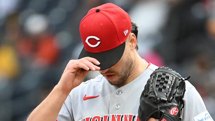 Cincinnati Reds relief pitcher Connor Phillips reacts