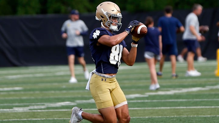 Notre Dame freshman Jordan Faison catches a pass during a drill