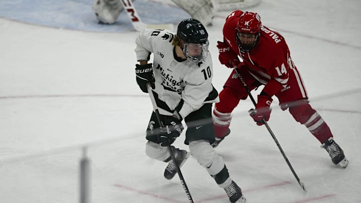 MSU's Tommi Männistö moves the puck against Joe Palodichuk of Wisconsin during the first period, Thursday, Jan. 2, 2024, at Munn Ice Arena. MSU's Tommi Männistö moves the puck against Joe Palodichuk of Wisconsin during the first period, Thursday, Jan. 2, 2024, at Munn Ice Arena.