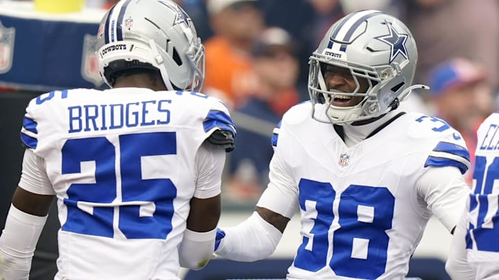Dallas Cowboys safety Alijah Clark and cornerback Trikweze Bridges against the Denver Broncos.