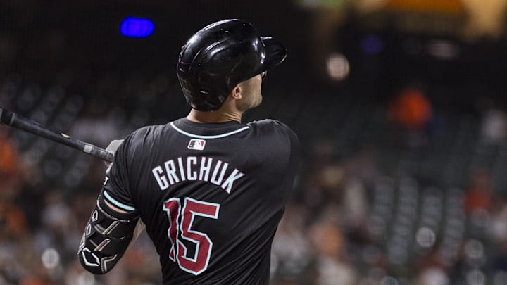 Sep 3, 2024; San Francisco, California, USA;  Arizona Diamondbacks left fielder Randal Grichuk (15) hits a solo home run against the San Francisco Giants during the fifth inning at Oracle Park. Mandatory Credit: John Hefti-Imagn Images