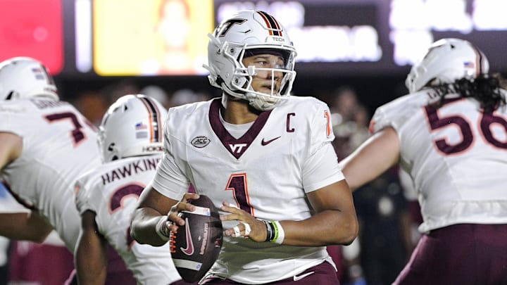 Nov 15, 2025; Tallahassee, Florida, USA; Virginia Tech Hokies quarterback Kyron Drones (1) looks to pass during the first half against the Florida State Seminoles at Doak S. Campbell Stadium. Mandatory Credit: Melina Myers-Imagn Images Nov 15, 2025; Tallahassee, Florida, USA; Virginia Tech Hokies quarterback Kyron Drones (1) looks to pass during the first half against the Florida State Seminoles at Doak S. Campbell Stadium. Mandatory Credit: Melina Myers-Imagn Images