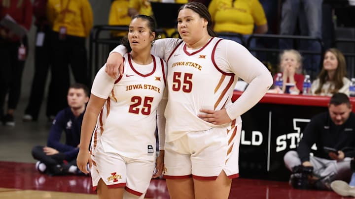 Jan 11, 2026; Ames, Iowa, USA; Iowa State Cyclones center Audi Crooks (55) talks with Iowa State Cyclones forward Sydney Harris (25) against the West Virginia Mountaineers during the second half at James H. Hilton Coliseum. Mandatory Credit: Reese Strickland-Imagn Images