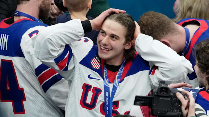 Milan, Italy; Jack Hughes of the United States celebrates after winning the men's ice hockey gold medal game during the Milano Cortina 2026 Olympic Winter Games at Milano Santagiulia Ice Hockey Arena.