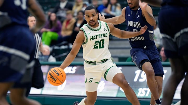 Stetson's Stephan Swenson attempts to drive to the basket during a game with North Florida at