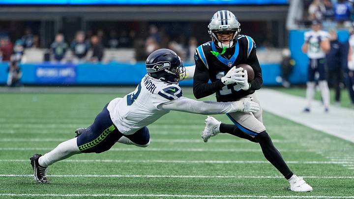 Carolina Panthers wide receiver Jimmy Horn Jr. (15) runs after the catch against Seattle Seahawks safety Nick Emmanwori Carolina Panthers wide receiver Jimmy Horn Jr. (15) runs after the catch against Seattle Seahawks safety Nick Emmanwori