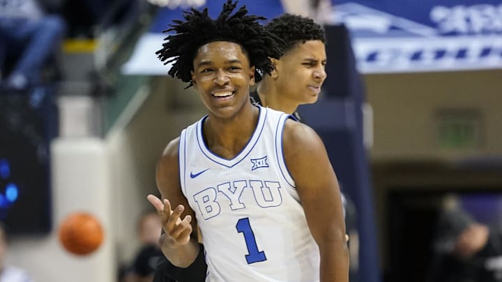 Feb 14, 2026; Provo, Utah, USA; BYU Cougars guard Robert Wright III (1) reacts to a made three point basket during the second half against the Colorado Buffaloes at the Marriott Center. Mandatory Credit: Aaron Baker-Imagn Images