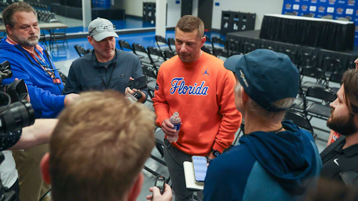 New Gator head football coach Jon Sumrall fires up the crowd during the first half an NCAA basketball game at Steven C. O'Connell Center Exactek arena in Gainesville, FL on Saturday, January 24, 2026. Auburn won 76-67 [Alan Youngblood/Gainesville Sun]