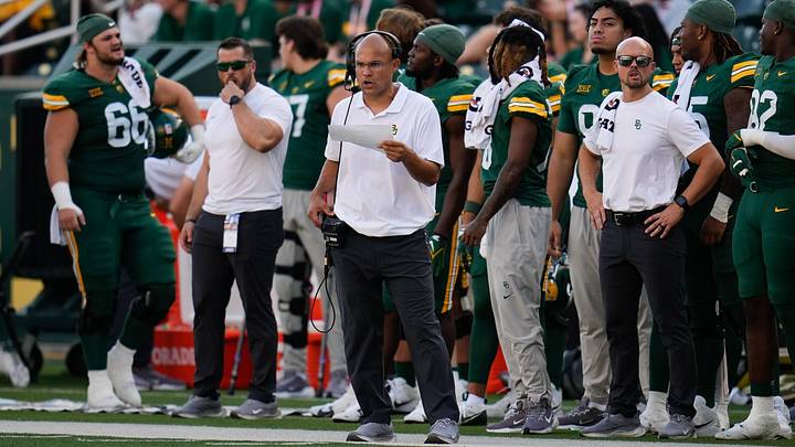 Oct 26, 2024; Waco, Texas, USA; Baylor Bears head coach Dave Aranda reacts during the second half against the Oklahoma State Cowboys at McLane Stadium. Mandatory Credit: Chris Jones-Imagn Images Oct 26, 2024; Waco, Texas, USA; Baylor Bears head coach Dave Aranda reacts during the second half against the Oklahoma State Cowboys at McLane Stadium. Mandatory Credit: Chris Jones-Imagn Images