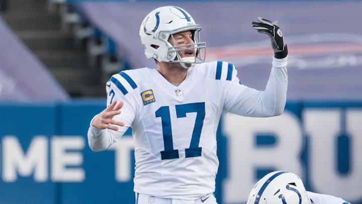 Jan 9, 2021; Orchard Park, New York, USA; Indianapolis Colts quarterback Philip Rivers (17) makes an adjustment at the line of scrimmage in the third quarter wildcard playoff game against the Buffalo Bills at Bills Stadium. Jan 9, 2021; Orchard Park, New York, USA; Indianapolis Colts quarterback Philip Rivers (17) makes an adjustment at the line of scrimmage in the third quarter wildcard playoff game against the Buffalo Bills at Bills Stadium.