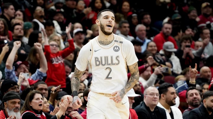 Jan 4, 2025; Chicago, Illinois, USA; Chicago Bulls guard Lonzo Ball (2) reacts after making a three point basket against the New York Knicks during the second half at United Center. Mandatory Credit: David Banks-Imagn Images