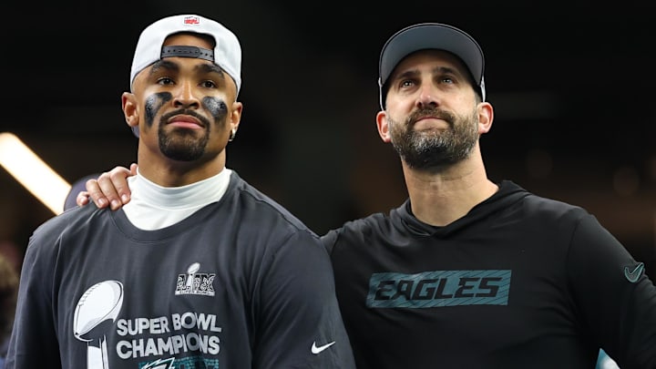 Feb 9, 2025; New Orleans, LA, USA; Philadelphia Eagles head coach Nick Sirianni and Philadelphia Eagles quarterback Jalen Hurts (1) on the podium after defeating the Kansas City Chiefs in Super Bowl LIX at Ceasars Superdome.
