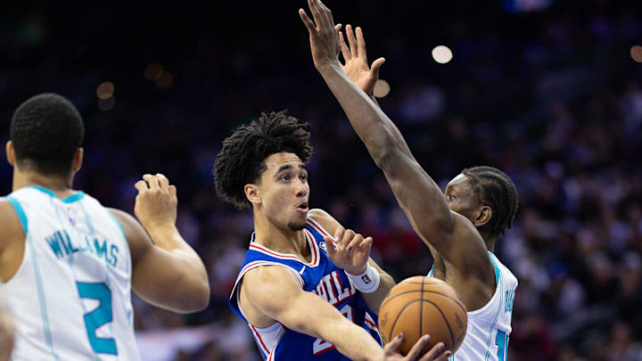 Nov 10, 2024; Philadelphia, Pennsylvania, USA; Philadelphia 76ers guard Jared McCain (20) shoots around Charlotte Hornets forward Moussa Diabate (14) during the fourth quarter at Wells Fargo Center. Mandatory Credit: Bill Streicher-Imagn Images Nov 10, 2024; Philadelphia, Pennsylvania, USA; Philadelphia 76ers guard Jared McCain (20) shoots around Charlotte Hornets forward Moussa Diabate (14) during the fourth quarter at Wells Fargo Center. Mandatory Credit: Bill Streicher-Imagn Images