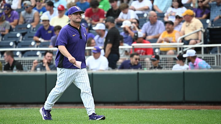 Jun 16, 2025; Omaha, Neb, USA;  LSU Tigers head coach Jay Johnson (3) walks to the dugout before the game against the UCLA Bruins at Charles Schwab Field. Mandatory Credit: Steven Branscombe-Imagn Images
