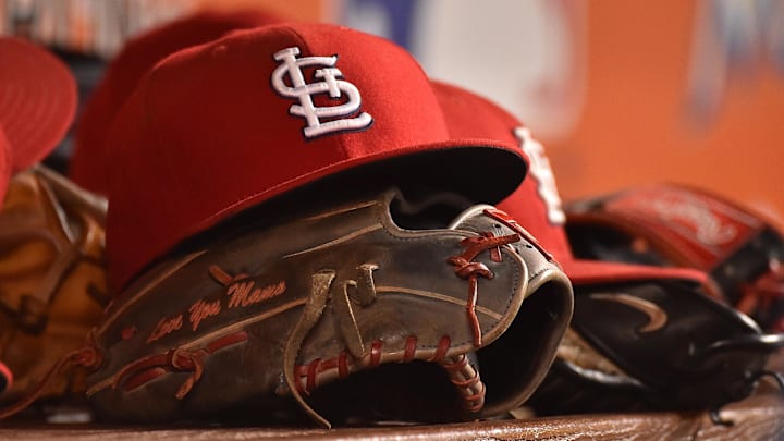 Jul 29, 2016; Miami, FL, USA; A detailed view of a hat and glove in the dugout of the St. Louis Cardinals in the game against the Miami Marlins at Marlins Park. The Cardinals defeated the Marlins 11-6. Mandatory Credit: Jasen Vinlove-Imagn Images Jul 29, 2016; Miami, FL, USA; A detailed view of a hat and glove in the dugout of the St. Louis Cardinals in the game against the Miami Marlins at Marlins Park. The Cardinals defeated the Marlins 11-6. Mandatory Credit: Jasen Vinlove-Imagn Images