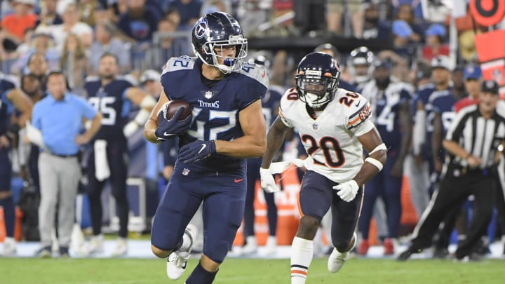 Aug 28, 2021; Nashville, TN, USA; Tennessee Titans tight end Miller Forristall (42) runs after making a catch as Chicago Bears cornerback Duke Shelley (20) gives chase during the second half at Nissan Stadium. 