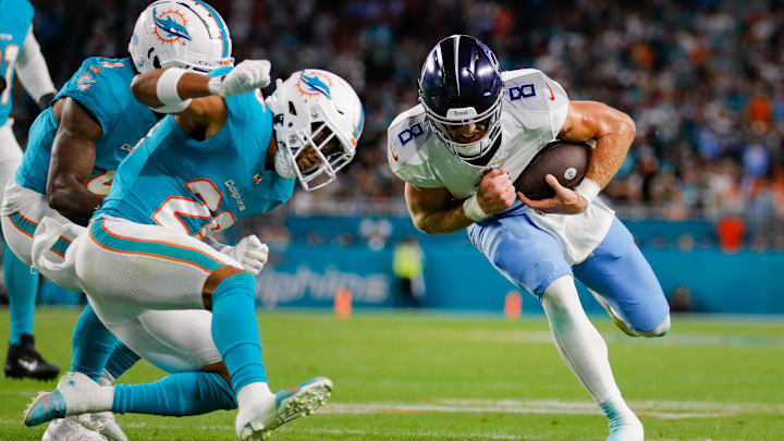 Tennessee Titans quarterback Will Levis (8) runs with the football as Miami Dolphins safety Brandon Jones (29) prepares to make a tackle during the second quarter at Hard Rock Stadium last December. Tennessee Titans quarterback Will Levis (8) runs with the football as Miami Dolphins safety Brandon Jones (29) prepares to make a tackle during the second quarter at Hard Rock Stadium last December.