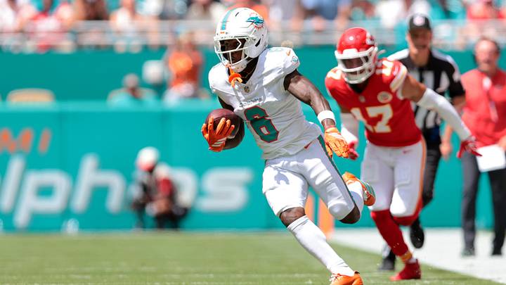 Miami Dolphins wide receiver Malik Washington (6) runs with the ball against the Kansas City Chiefs during the first quarter at Hard Rock Stadium. Miami Dolphins wide receiver Malik Washington (6) runs with the ball against the Kansas City Chiefs during the first quarter at Hard Rock Stadium.