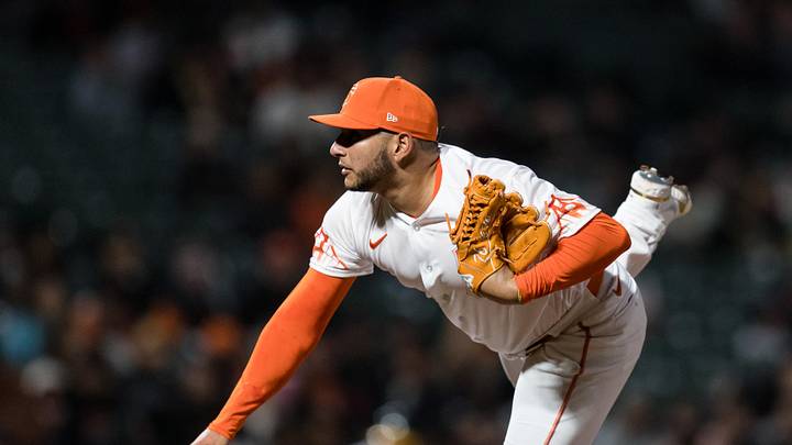 Apr 26, 2022; San Francisco, California, USA;  San Francisco Giants closing pitcher Kervin Castro (76) throws against the Oakland Athletics during the night inning at Oracle Park. Mandatory Credit: John Hefti-Imagn Images
