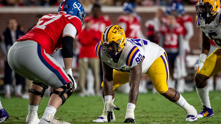 Nov 16, 2019; Oxford, MS, USA; Louisiana State Tigers defensive lineman Neil Farrell, Jr. (92) lines up against the Mississippi Rebels in the first half at Vaught-Hemingway Stadium. Mandatory Credit: Vasha Hunt-Imagn Images