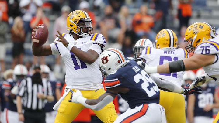 Oct 31, 2020; Auburn, Alabama, USA;  LSU Tigers quarterback TJ Finley (11) drops back to pass against the Auburn Tigers during the first quarter at Jordan-Hare Stadium. Mandatory Credit: John Reed-Imagn Images