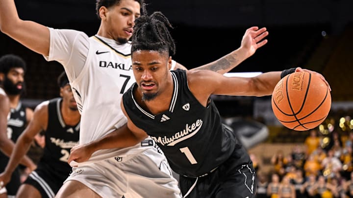 UW-Milwaukee Panthers guard Themus Fulks (1) drives to the basket against Oakland Golden Grizzlies guard Isaiah Jones (7) during the second half in a game Thursday, February 27, 2025, at the UWM Panther Arena in Milwaukee, Wisconsin. UWM won, 71-66.