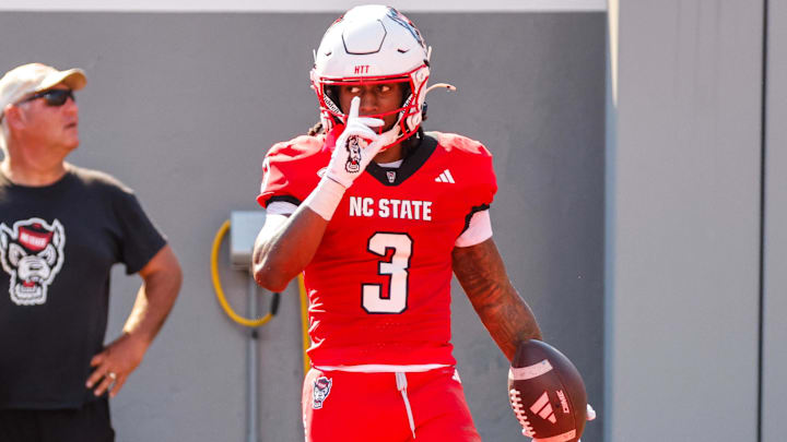 Oct 4, 2025; Raleigh, North Carolina, USA; NC State Wolfpack running back Hollywood Smothers (3) celebrates a touchdown during the first half of the game against Campbell Fighting Camels at Carter-Finley Stadium. Mandatory Credit: Jaylynn Nash-Imagn Images Oct 4, 2025; Raleigh, North Carolina, USA; NC State Wolfpack running back Hollywood Smothers (3) celebrates a touchdown during the first half of the game against Campbell Fighting Camels at Carter-Finley Stadium. Mandatory Credit: Jaylynn Nash-Imagn Images