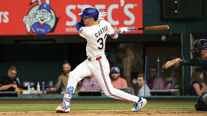 Sep 3, 2026; Arlington, Texas, USA; Texas Rangers center fielder Evan Carter (32) hits an rbi triple during the eighth inning against the Tampa Bay Rays at Globe Life Field. Mandatory Credit: Kevin Jairaj-Imagn Images Sep 3, 2026; Arlington, Texas, USA; Texas Rangers center fielder Evan Carter (32) hits an rbi triple during the eighth inning against the Tampa Bay Rays at Globe Life Field. Mandatory Credit: Kevin Jairaj-Imagn Images