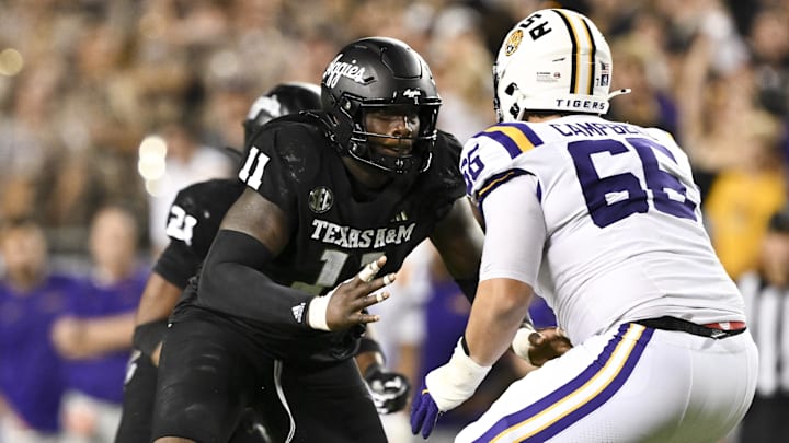 Texas A&M Aggies defensive lineman Nic Scourton (11) attacks LSU offensive tackle Will Campbell.