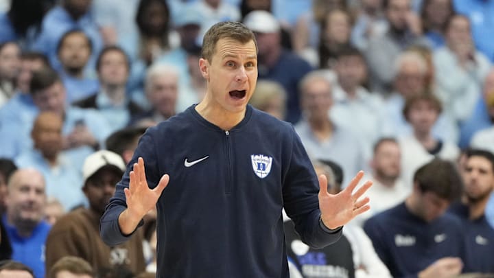 Feb 3, 2024; Chapel Hill, North Carolina, USA; Duke Blue Devils head coach Jon Scheyer reacts in the second half at Dean E. Smith Center. Mandatory Credit: Bob Donnan-Imagn Images Feb 3, 2024; Chapel Hill, North Carolina, USA; Duke Blue Devils head coach Jon Scheyer reacts in the second half at Dean E. Smith Center. Mandatory Credit: Bob Donnan-Imagn Images