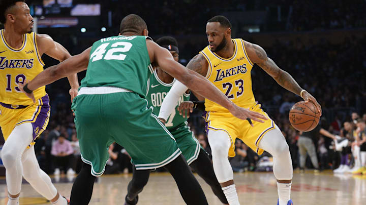 March 9, 2019; Los Angeles, CA, USA; Los Angeles Lakers forward LeBron James (23) moves the ball against Boston Celtics center Al Horford (42) during the first half at Staples Center. Mandatory Credit: Gary A. Vasquez-Imagn Images March 9, 2019; Los Angeles, CA, USA; Los Angeles Lakers forward LeBron James (23) moves the ball against Boston Celtics center Al Horford (42) during the first half at Staples Center. Mandatory Credit: Gary A. Vasquez-Imagn Images