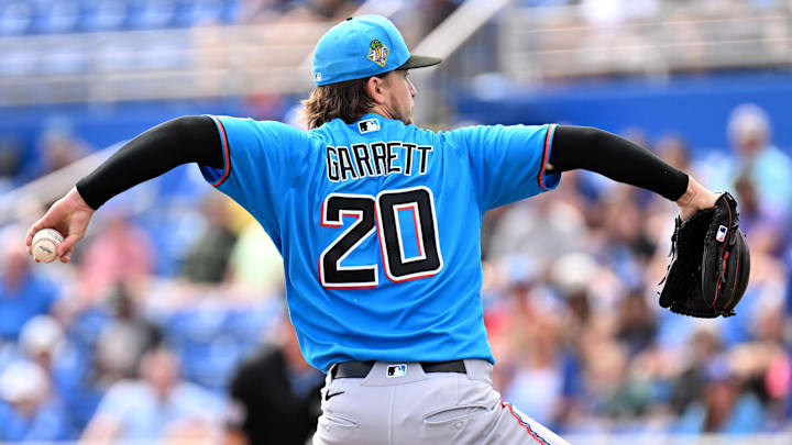 Florida Marlins starting pitcher Braxton Garrett (20) throws a pitch in the first inning against the Toronto Blue Jays during spring training at TD Ballpark. 
