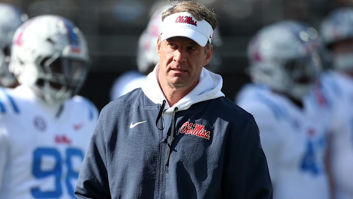 Nov 28, 2025; Starkville, Mississippi, USA; Mississippi Rebels head coach Lane Kiffin looks on before the game against the Mississippi State Bulldogs at Davis Wade Stadium at Scott Field. Mandatory Credit: Petre Thomas-Imagn Images