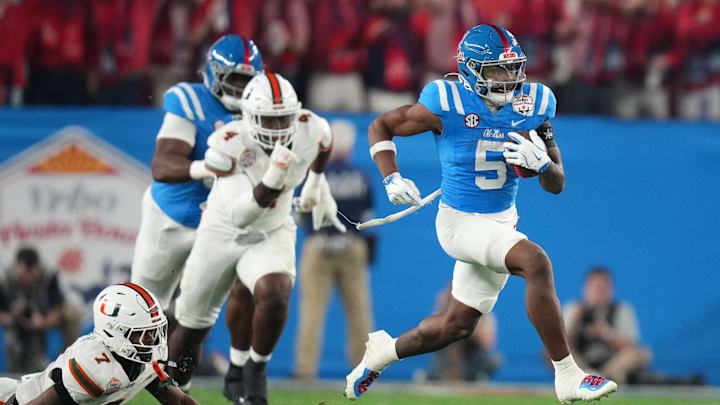 Ole Miss Rebels running back Kewan Lacy (5) scores on a 73-yard touchdown run against the Miami Hurricanes during their Vrbo Fiesta Bowl matchup at State Farm Stadium on Jan. 8, 2026. Ole Miss Rebels running back Kewan Lacy (5) scores on a 73-yard touchdown run against the Miami Hurricanes during their Vrbo Fiesta Bowl matchup at State Farm Stadium on Jan. 8, 2026.