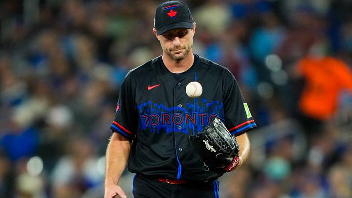 Apr 24, 2026; Toronto, Ontario, CAN;  Toronto Blue Jays pitcher Max Scherzer (31) juggles the ball at a MLB game against the Cleveland Guardians at Rogers Centre. Mandatory Credit: Kevin Sousa-Imagn Images