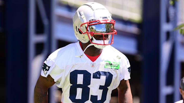 Jun 10, 2024; Foxborough, MA, USA; New England Patriots wide receiver Jalen Reagor (83) walks to the practice fields for minicamp at Gillette Stadium. Mandatory Credit: Eric Canha-Imagn Images